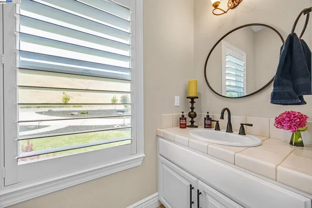 a view of yard with patio