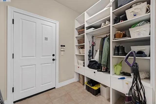 a view of a swimming pool with outdoor seating