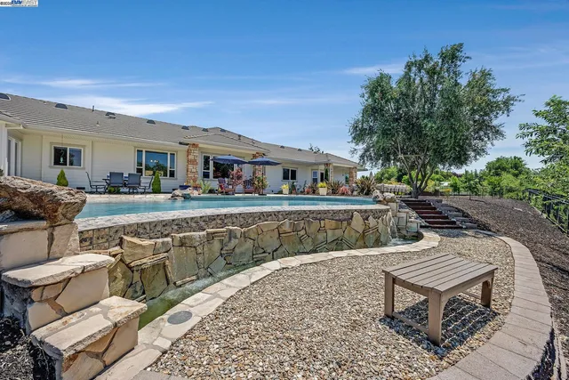 a outdoor living space with furniture and garden view