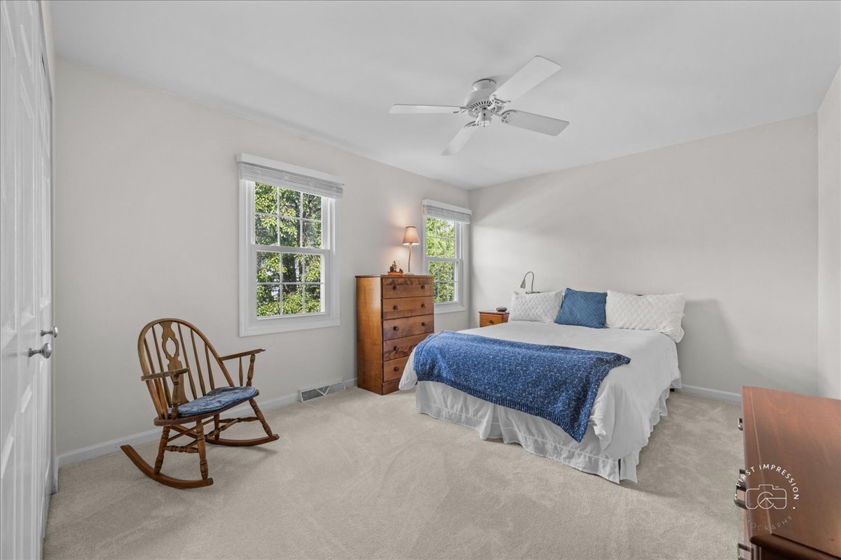 1432 Calcutta Lane Naperville, IL 60563 - Photo 32 of 43 a bedroom with a bed chair and window