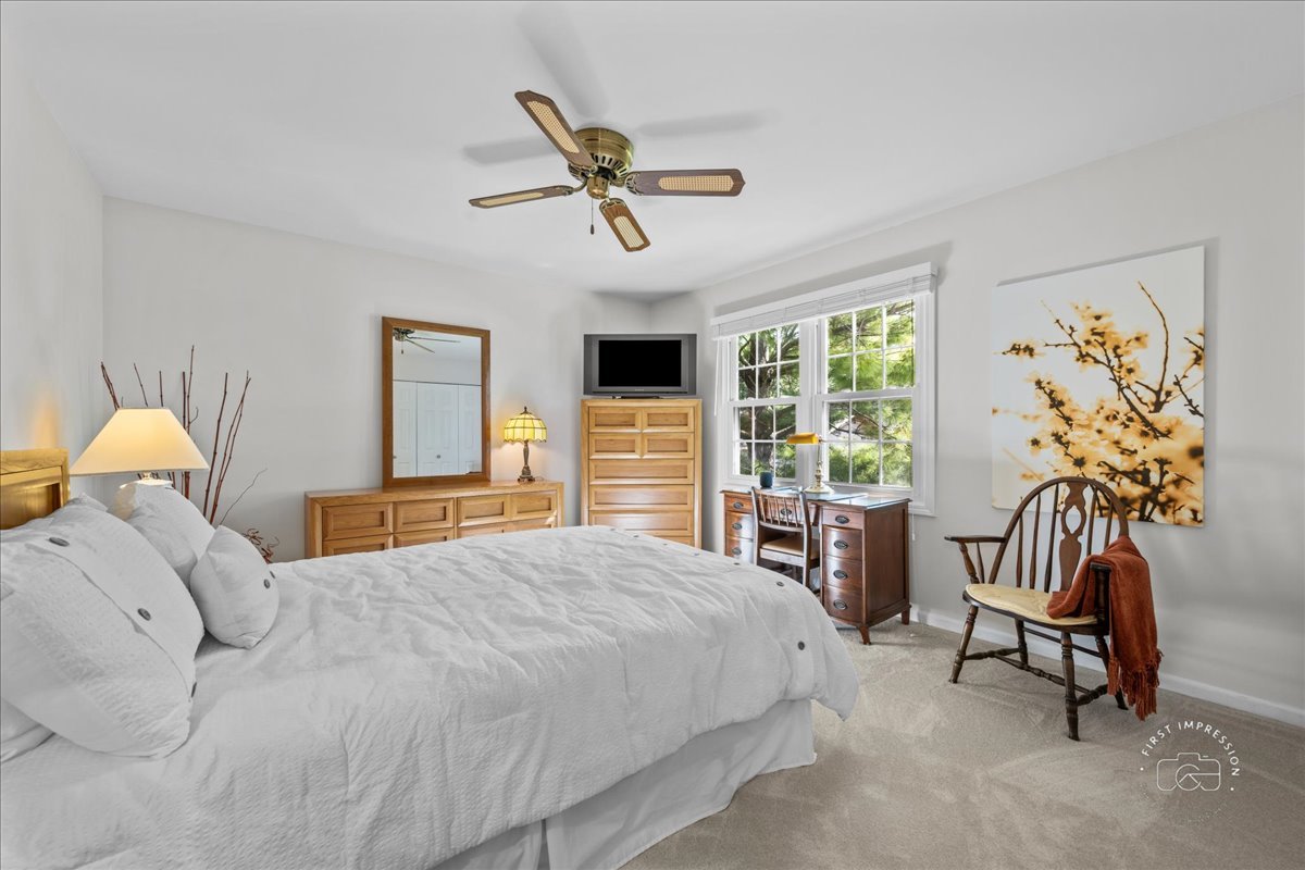 1432 Calcutta Lane Naperville, IL 60563 - Photo 33 of 43 a bedroom with a bed and a window