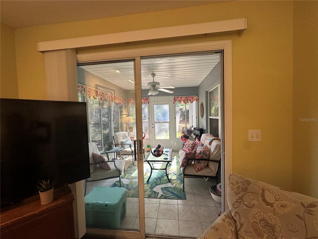 8649 Southwest 108th Ln Road Ocala, FL 34481 - Photo 52 of 72 SLIDER TO LANAI