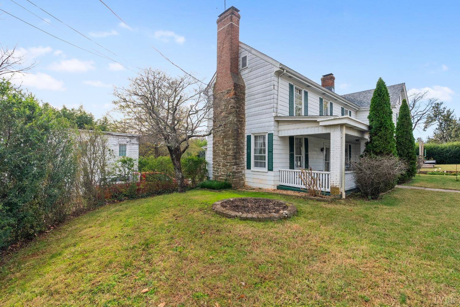 243 South Main Street Amherst, VA 24521 - Photo 1 of 57 a front view of a house with a yard