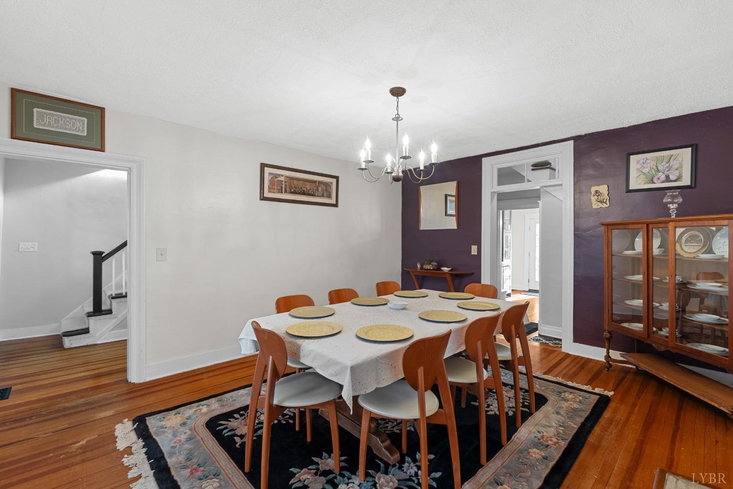 243 South Main Street Amherst, VA 24521 - Photo 21 of 57 a view of a dining room with furniture window and wooden floor