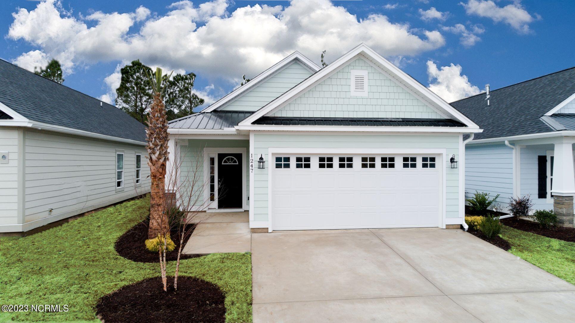 7631 Privateer Loop Sunset Beach, NC 28468 - Photo 6 of 24 Pictures, photographs, colors, features, and sizes are for illustration purposes only and will vary from the homes as built.