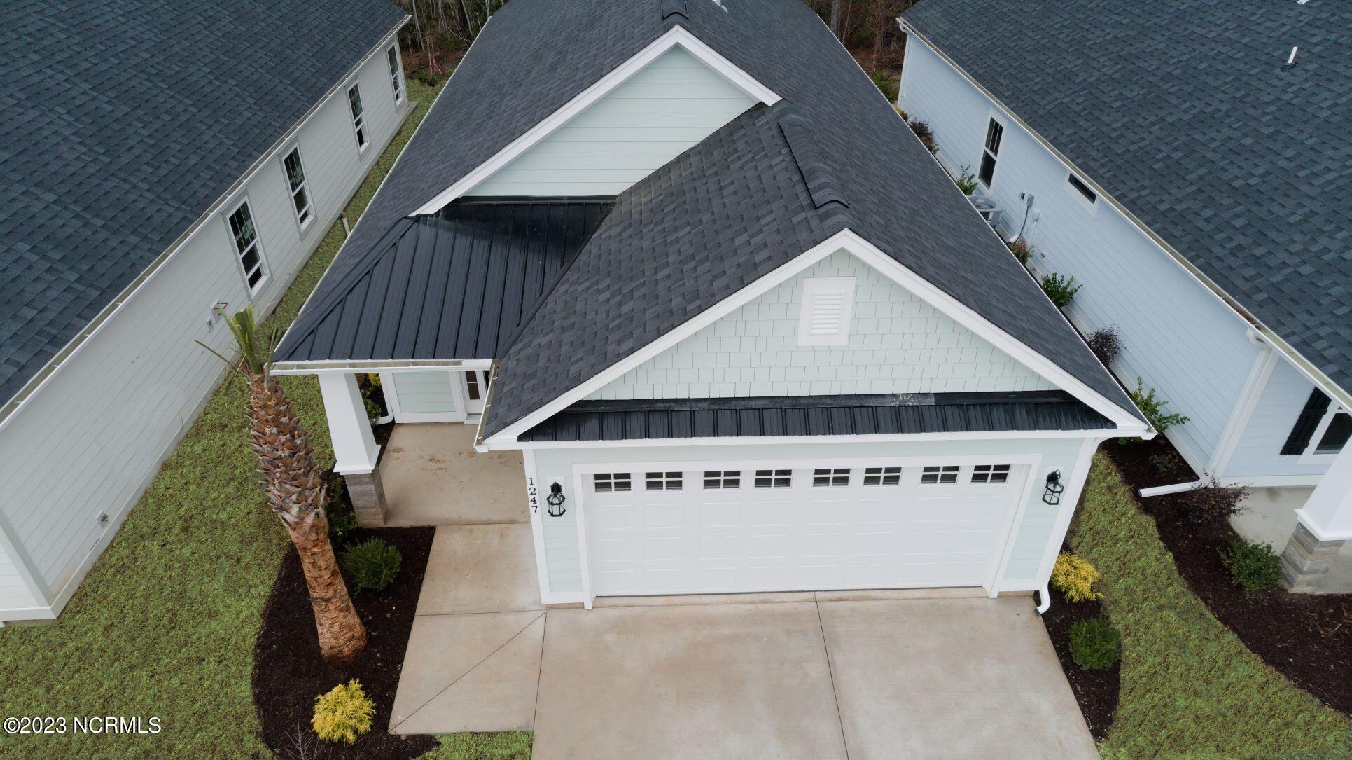 7631 Privateer Loop Sunset Beach, NC 28468 - Photo 7 of 24 Pictures, photographs, colors, features, and sizes are for illustration purposes only and will vary from the homes as built.