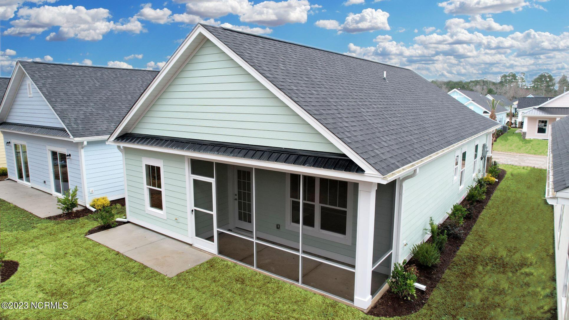 7631 Privateer Loop Sunset Beach, NC 28468 - Photo 8 of 24 Pictures, photographs, colors, features, and sizes are for illustration purposes only and will vary from the homes as built.