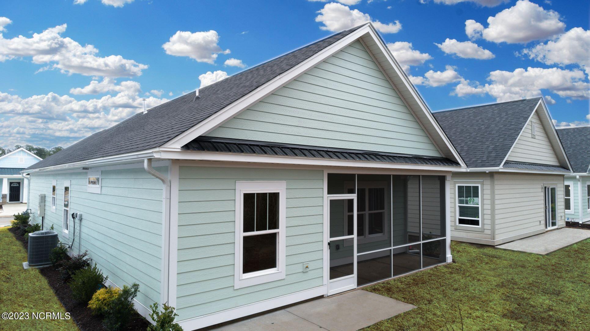 7631 Privateer Loop Sunset Beach, NC 28468 - Photo 9 of 24 Pictures, photographs, colors, features, and sizes are for illustration purposes only and will vary from the homes as built.