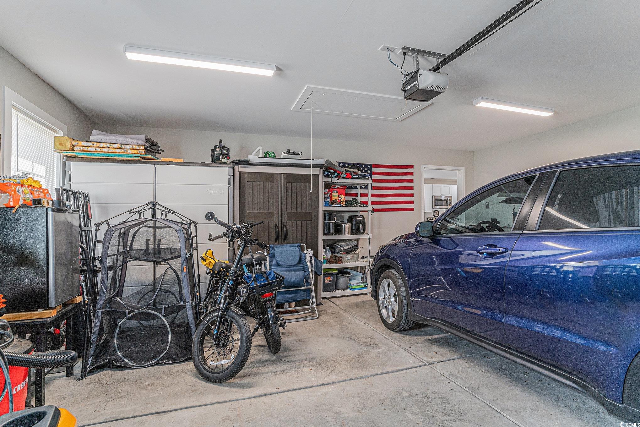 2602 Floribunda Lane Conway, SC 29527 - Photo 22 of 28 Garage with a garage door opener