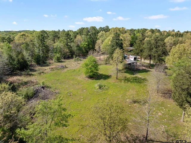 a view of lake with green space