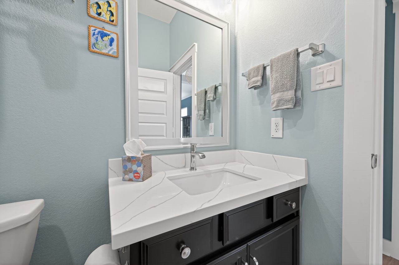 16707 Seminole Ridge Drive Cypress, TX 77433 - Photo 17 of 26 a bathroom with a sink and a mirror