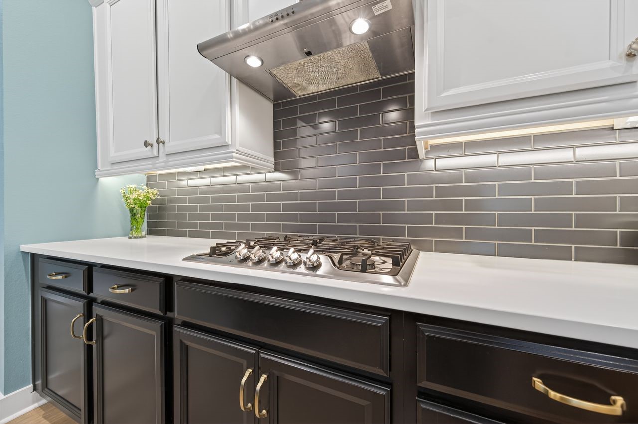 16707 Seminole Ridge Drive Cypress, TX 77433 - Photo 7 of 26 a kitchen with a sink and cabinets