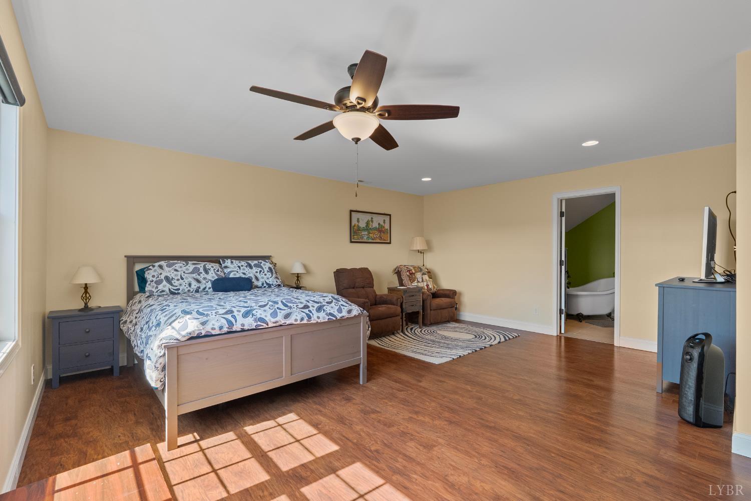 106 Nettie Court Lynchburg, VA 24502 - Photo 26 of 55 a living room with furniture and a chandelier