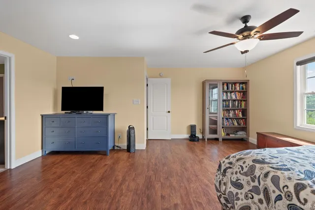 a bathroom with a bathtub and shower