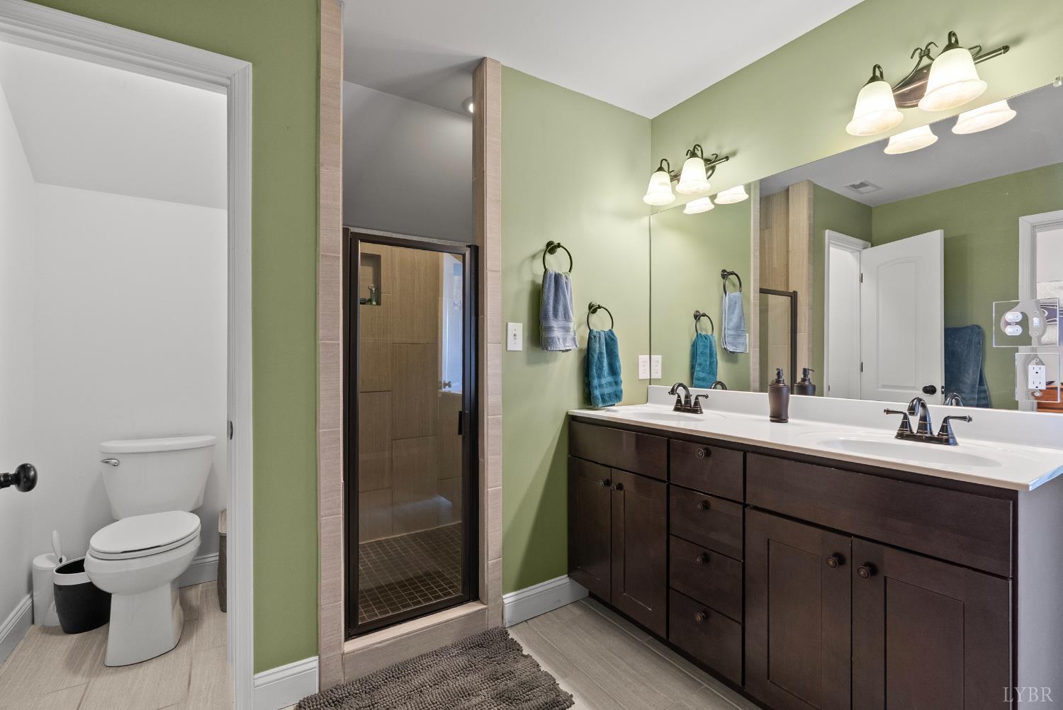 106 Nettie Court Lynchburg, VA 24502 - Photo 29 of 55 a bathroom with a toilet sink and mirror