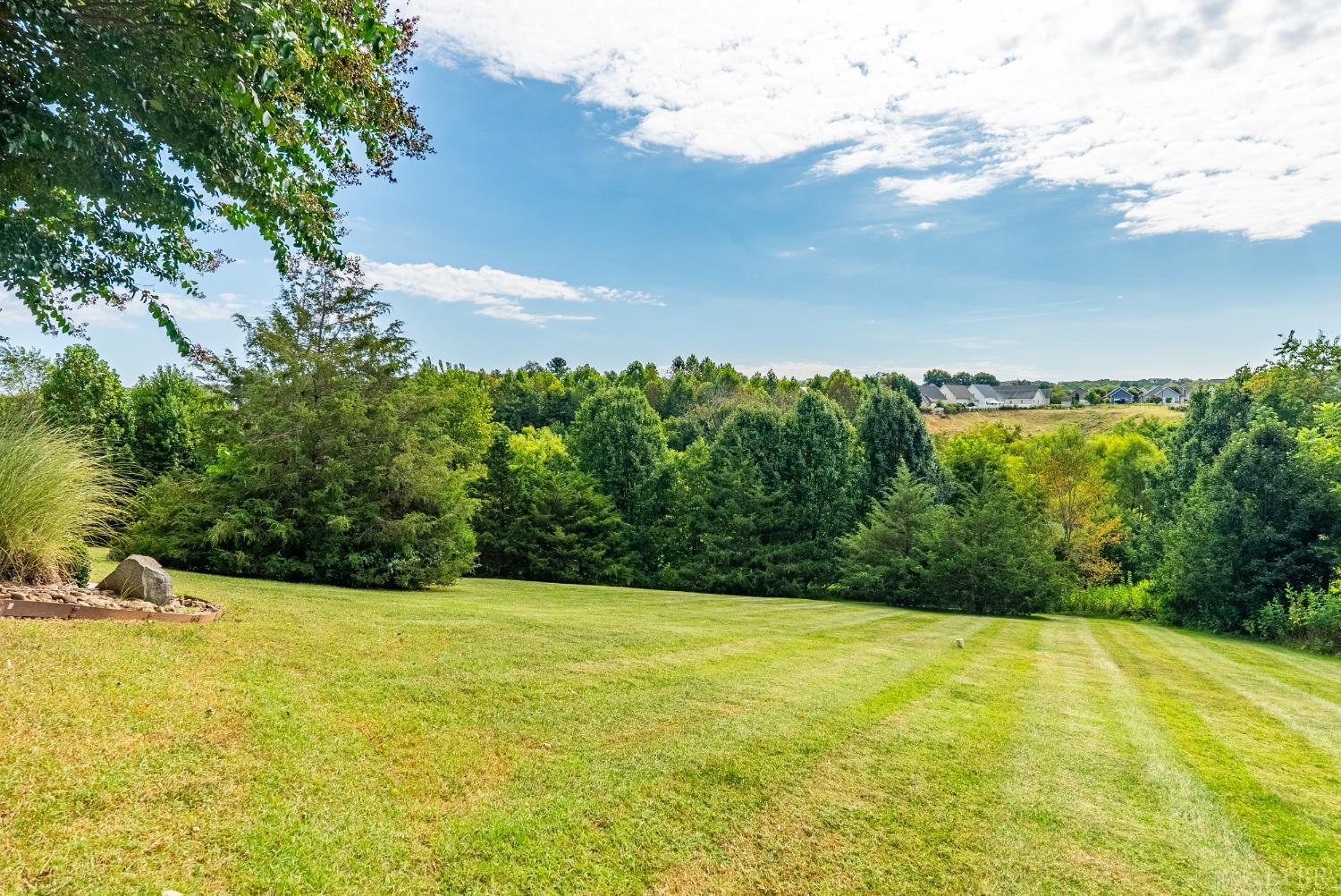 106 Nettie Court Lynchburg, VA 24502 - Photo 39 of 55 a view of a swimming pool with an outdoor seating and a yard