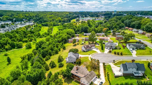 a picture of a bench in front of a window