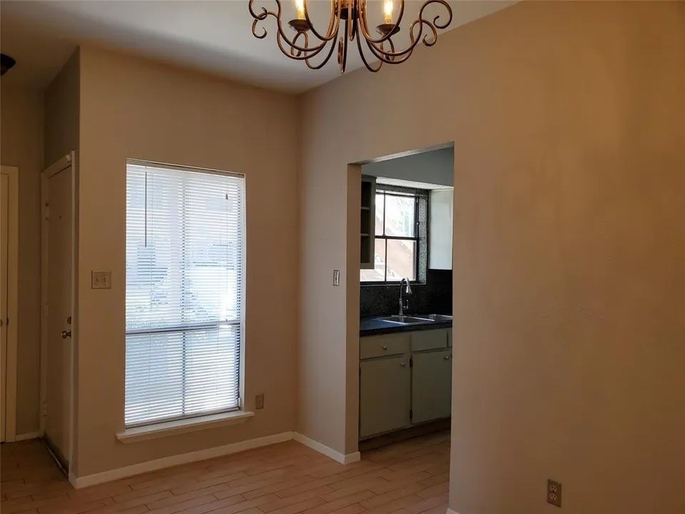 5000 Milwee Street, Unit 44 Houston, TX 77092 - Photo 4 of 16 a view of empty room with windows and fan