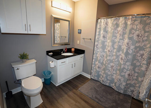 5128 West Bluemound Road, Unit 201 Milwaukee, WI 53208 - Photo 13 of 18 Guest Bathroom