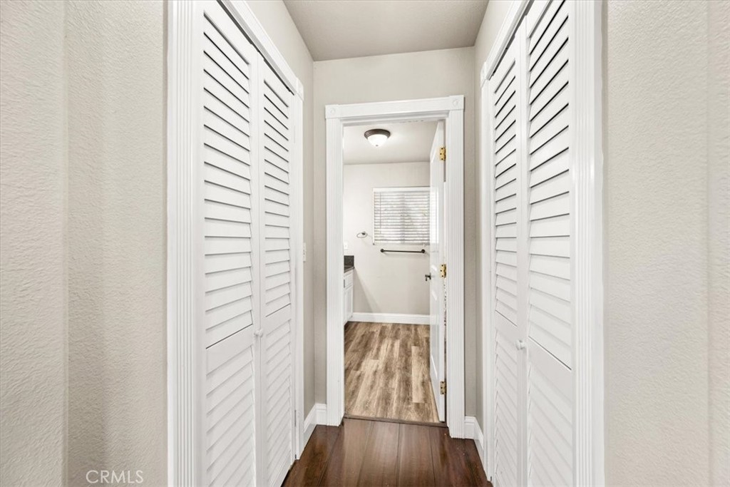 7687 Sinaloa Avenue Atascadero, CA 93422 - Photo 18 of 34 a view of a hallway with wooden floor