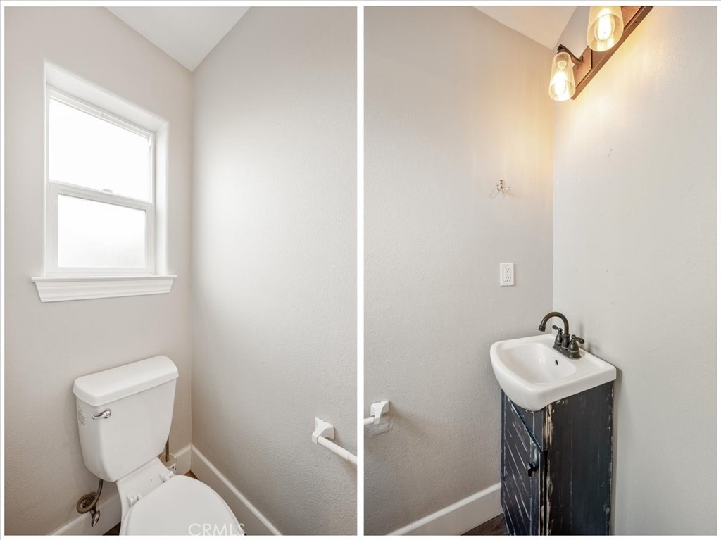 7687 Sinaloa Avenue Atascadero, CA 93422 - Photo 26 of 34 a bathroom with a sink mirror and toilet