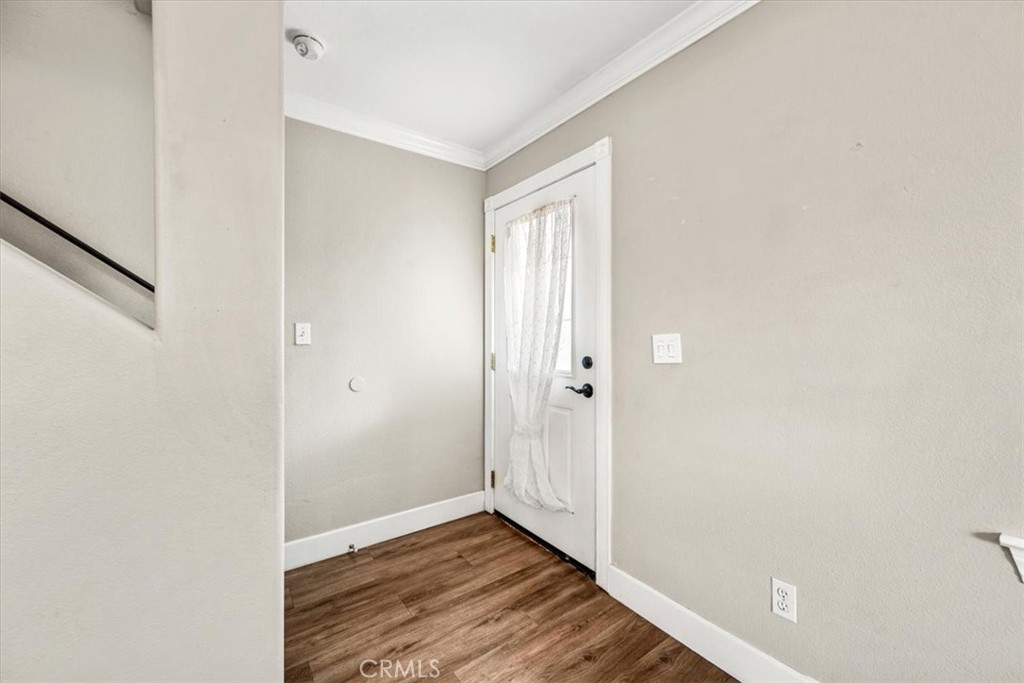 7687 Sinaloa Avenue Atascadero, CA 93422 - Photo 6 of 34 a view of an empty room with wooden floor