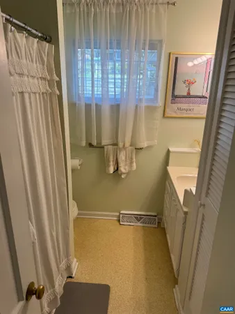 a view of walk in closet with window