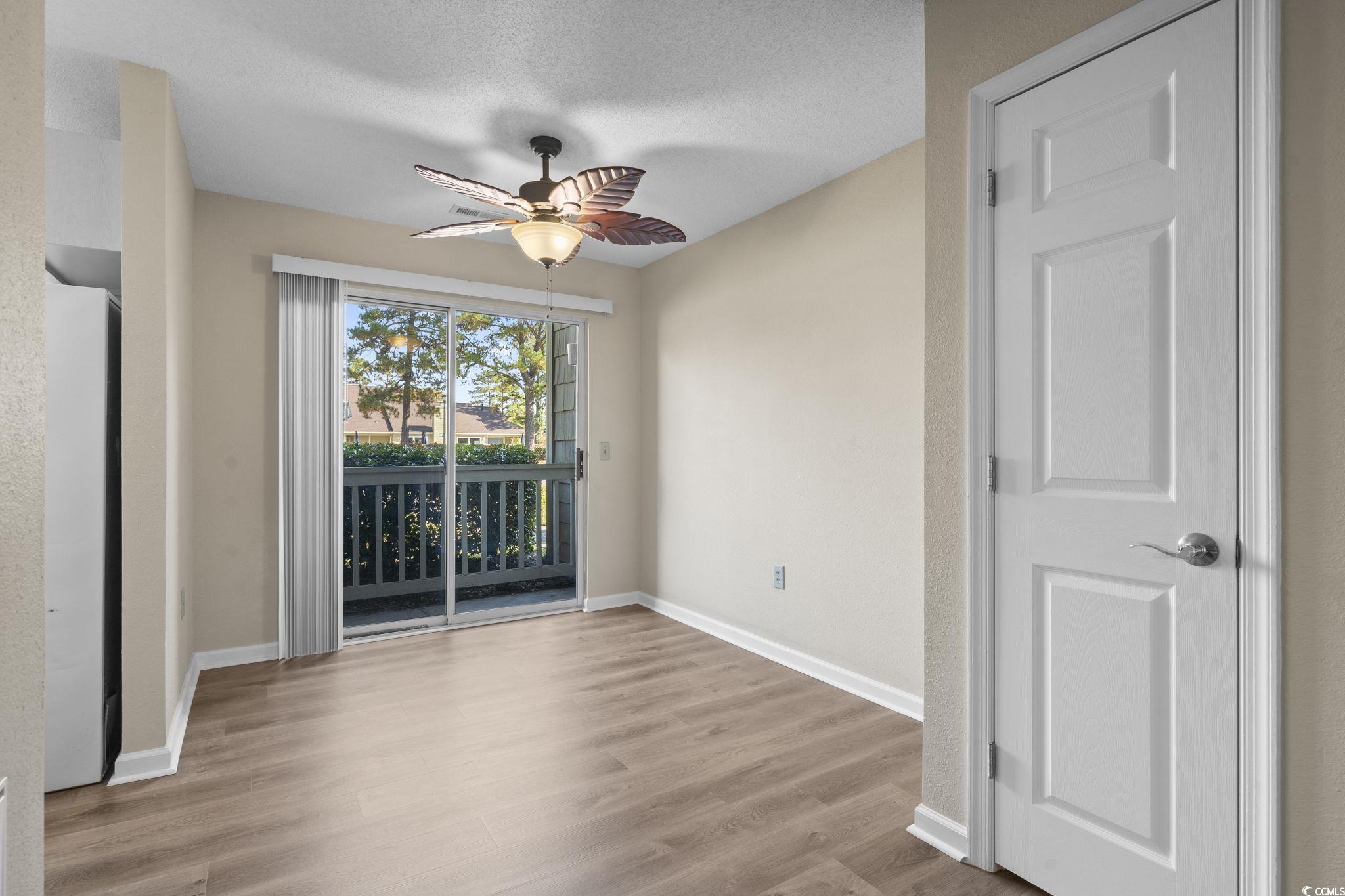 400 Myrtle Greens Drive, Unit C Conway, SC 29526 - Photo 5 of 29 Dining Room Area - Door is to the front door