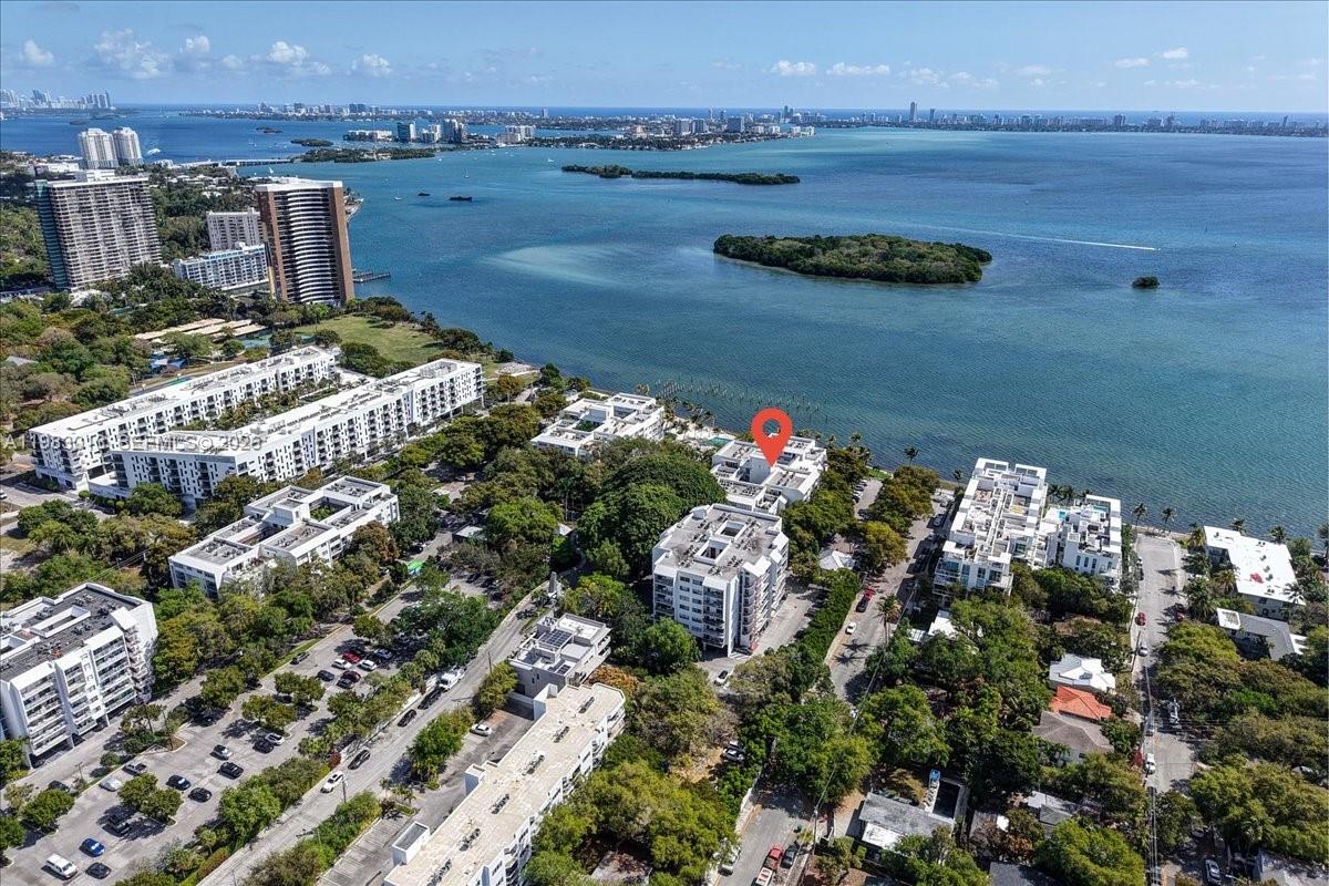 777 Northeast 62nd Street, Unit C211 Miami, FL 33138 - Photo 17 of 22 a view of a lake and outdoor space