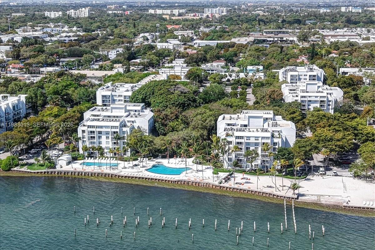 777 Northeast 62nd Street, Unit C211 Miami, FL 33138 - Photo 22 of 22 a view of a city with tall buildings