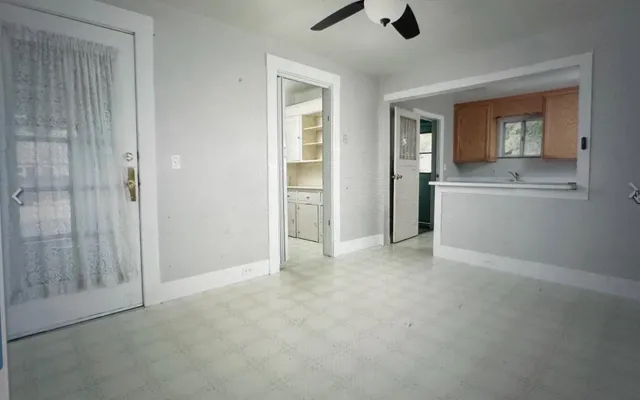 a view of livingroom with hardwood floor and a ceiling fan
