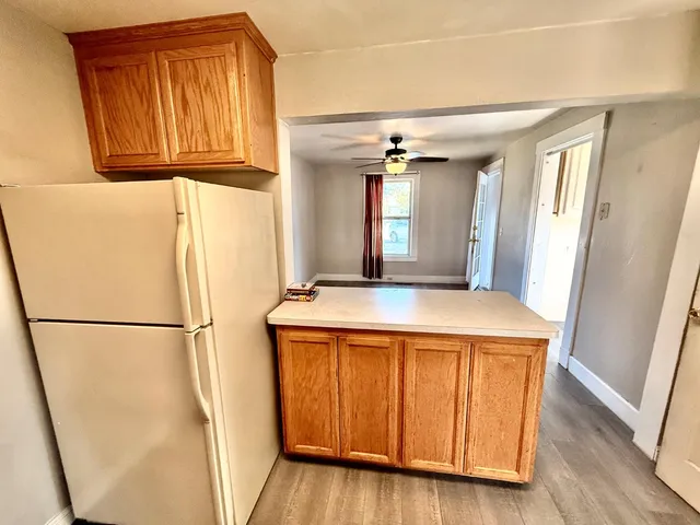 a view of a kitchen with a sink and dishwasher