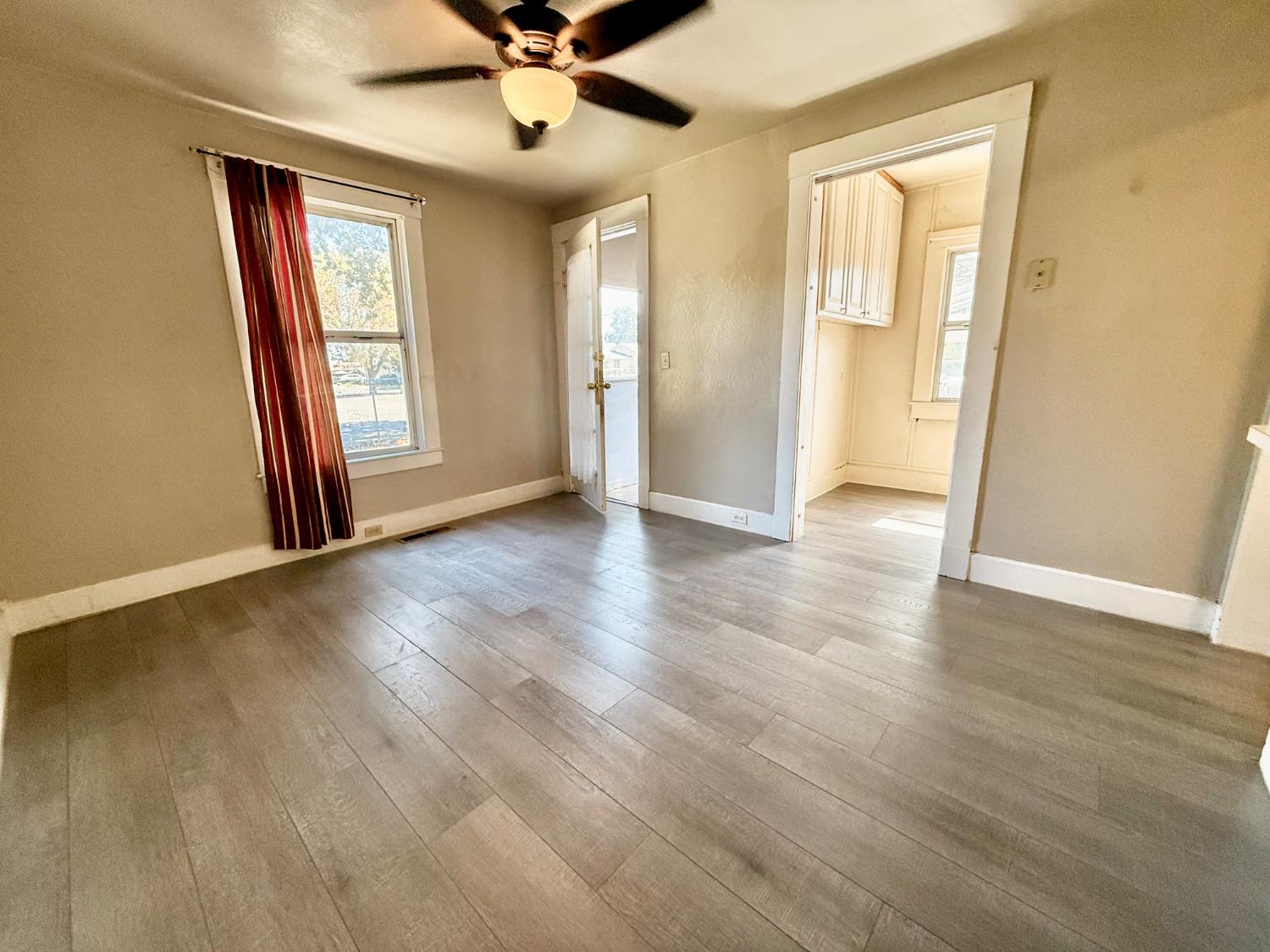 345 Fremont Street Colusa, CA 95932 - Photo 29 of 42 an empty room with wooden floor and windows