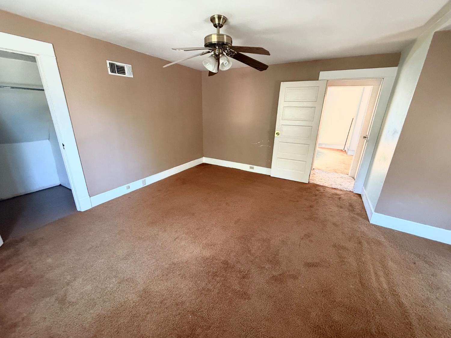 345 Fremont Street Colusa, CA 95932 - Photo 30 of 42 wooden floor in an empty room with a window