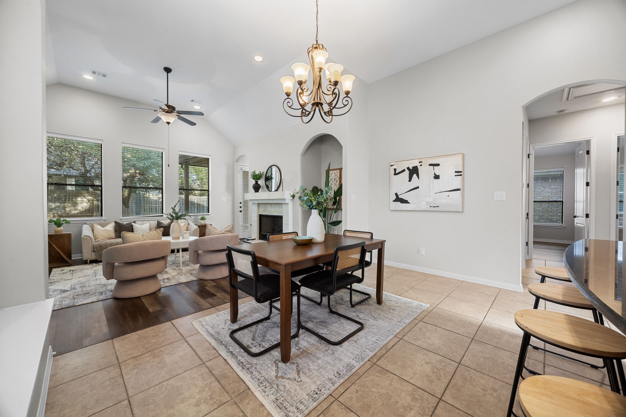 1412 Rimstone Drive Cedar Park, TX 78613 - Photo 11 of 39 a view of a dining room with furniture a chandelier and wooden floor