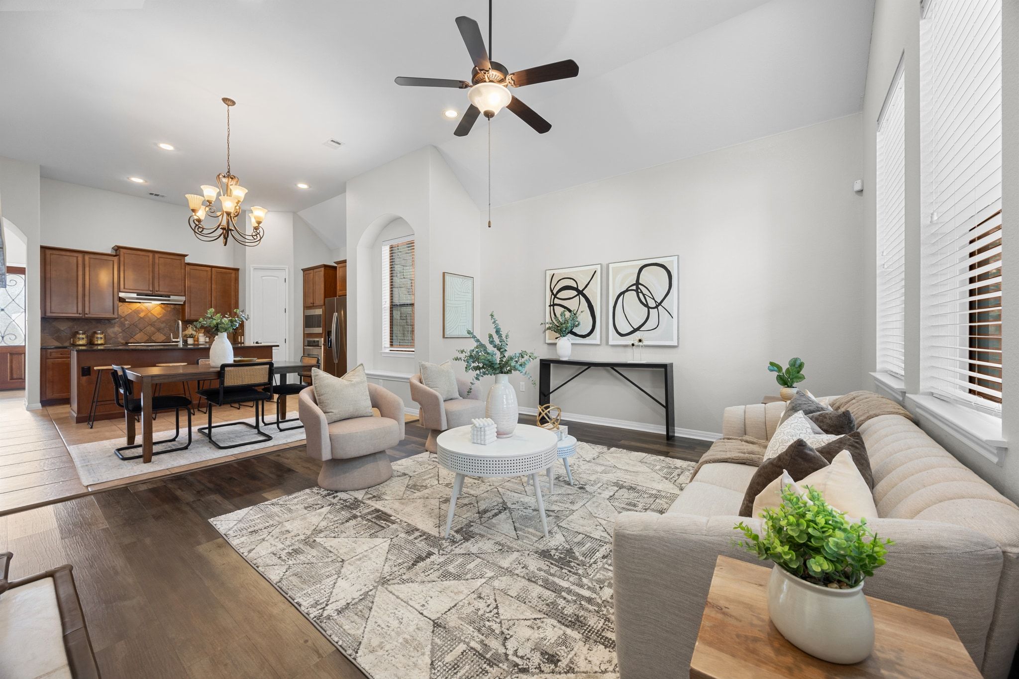 1412 Rimstone Drive Cedar Park, TX 78613 - Photo 16 of 39 a living room with furniture chandelier and a chandelier