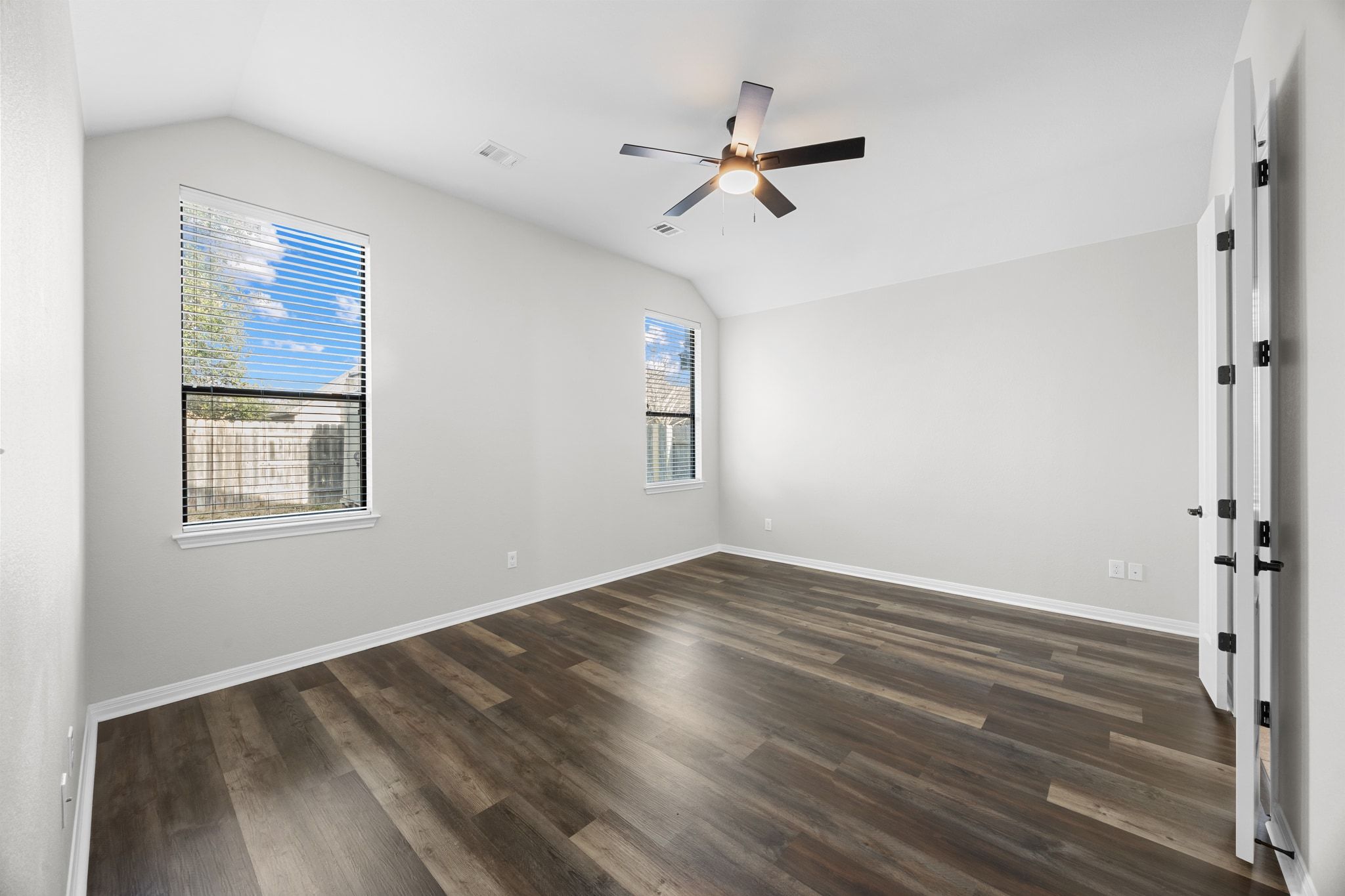 1412 Rimstone Drive Cedar Park, TX 78613 - Photo 23 of 39 a view of empty room with wooden floor and fan