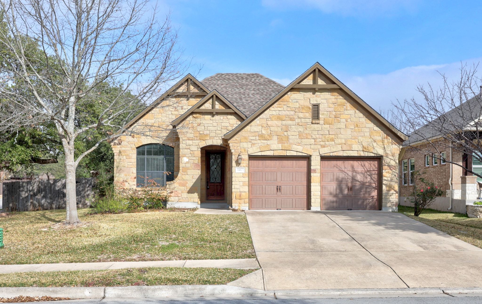 1412 Rimstone Drive Cedar Park, TX 78613 - Photo 3 of 39 a front view of a house with garden