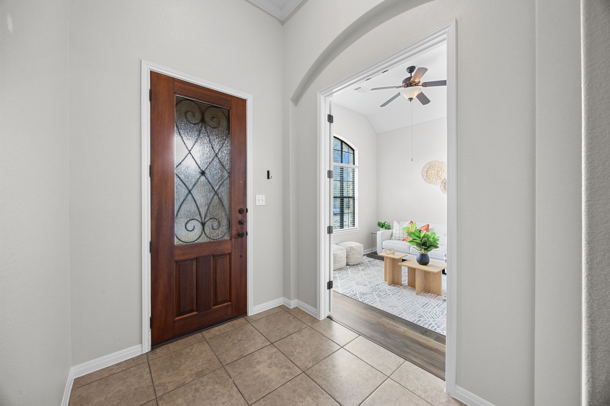 1412 Rimstone Drive Cedar Park, TX 78613 - Photo 5 of 39 a hallway with painting and flower pot