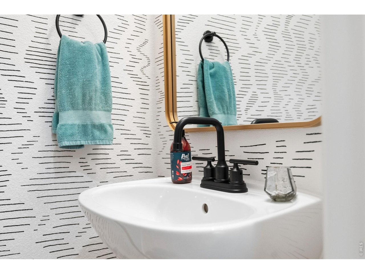 1221 East Prospect Road, Unit 3 Fort Collins, CO 80525 - Photo 14 of 37 Main floor powder bath with pedestal sink.