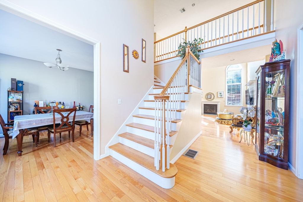300 Crownshield Avenue Uxbridge, MA 01569 - Photo 4 of 24 a view of entryway and hall with wooden floor