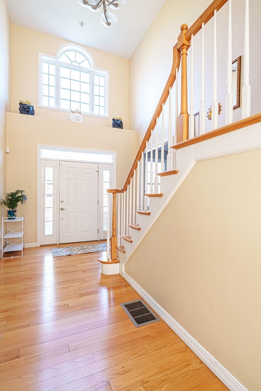 300 Crownshield Avenue Uxbridge, MA 01569 - Photo 5 of 24 a view of an entryway with wooden floor