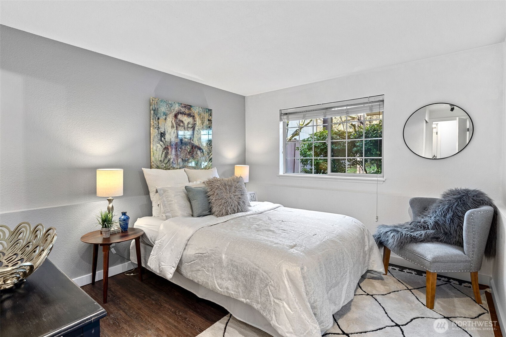 9806 28th Avenue Southwest, Unit A104 Seattle, WA 98126 - Photo 12 of 25 a bedroom with a bed and window