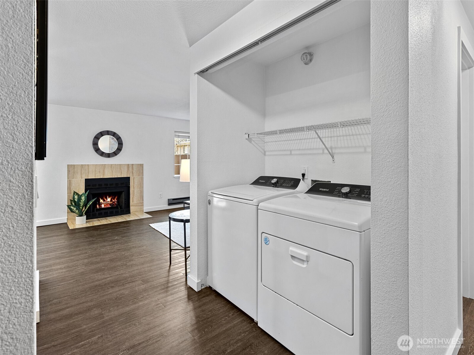 9806 28th Avenue Southwest, Unit A104 Seattle, WA 98126 - Photo 20 of 25 a room with furniture and a fireplace