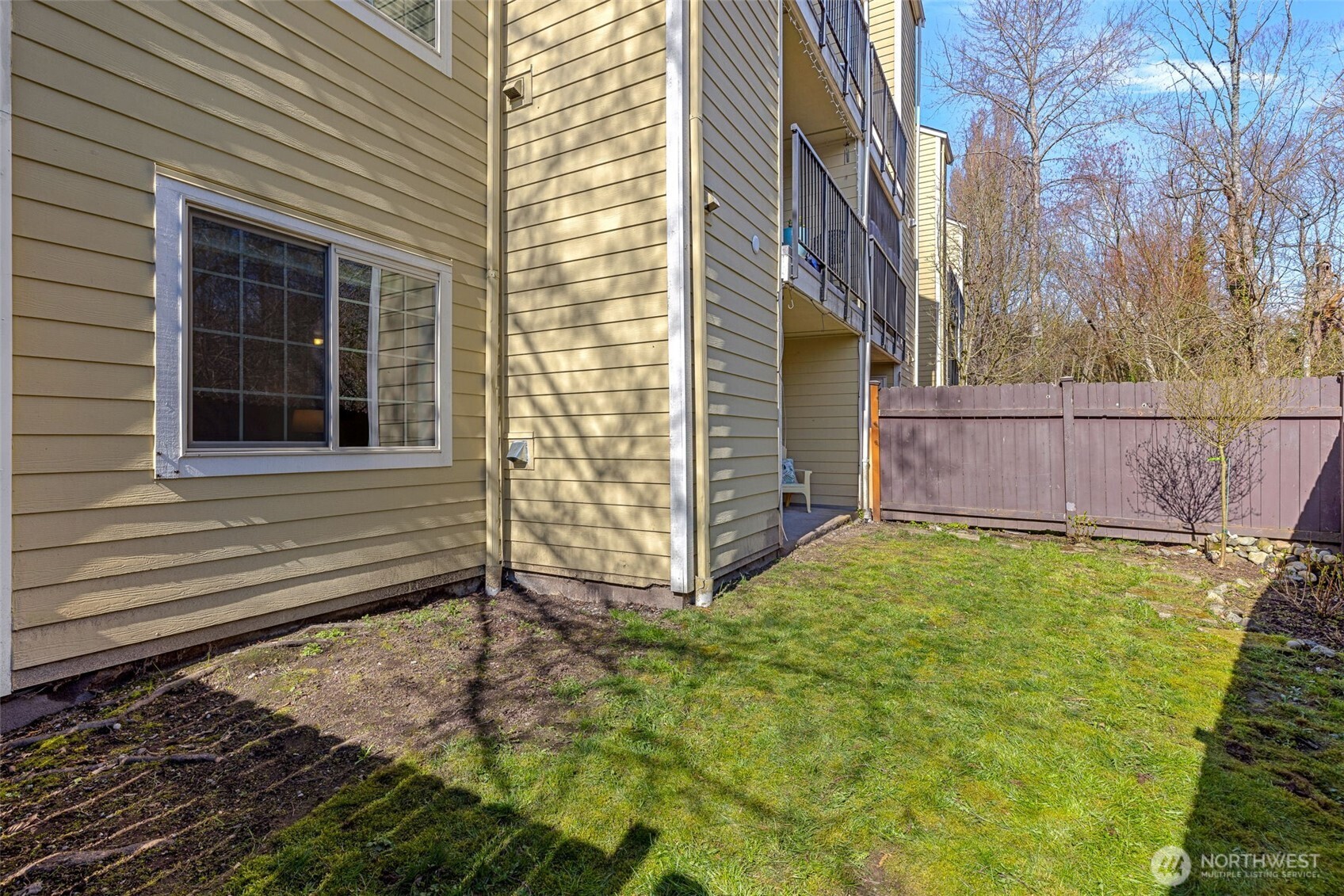 9806 28th Avenue Southwest, Unit A104 Seattle, WA 98126 - Photo 22 of 25 a view of a backyard