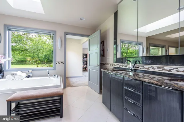 a large kitchen with a large window