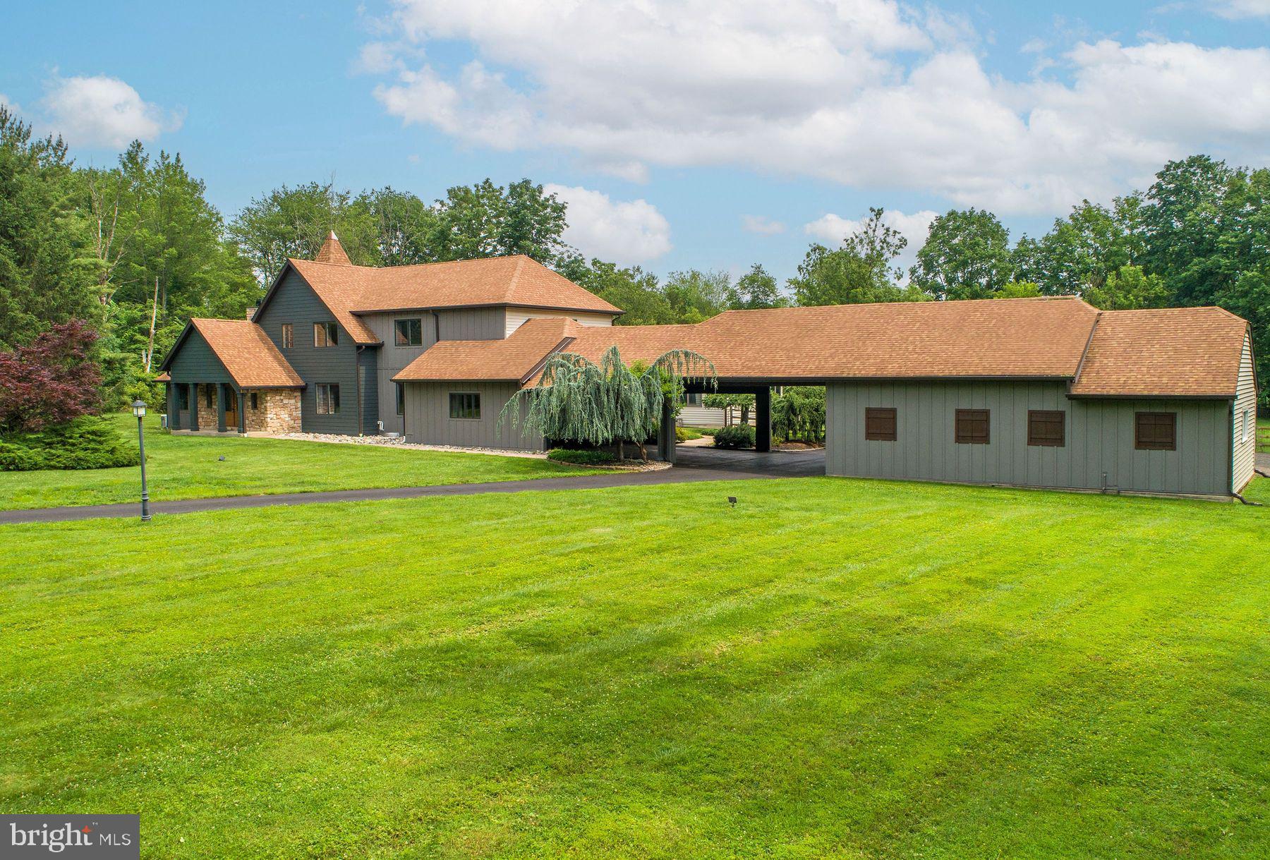 125 Edison Furlong Road Doylestown, PA 18901 - Photo 50 of 51 a front view of a house with a garden