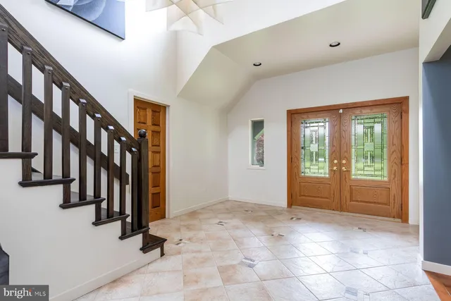 a view of an entryway with staircase