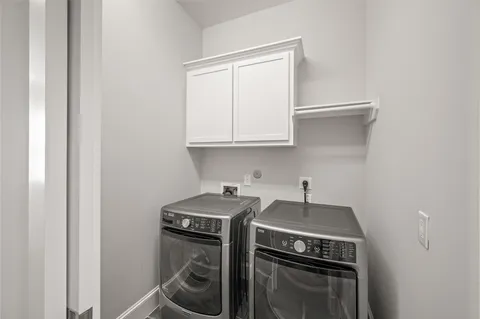 a kitchen with a stove and a sink