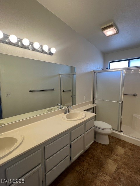 1117 Grillo Way Boulder City, NV 89005 - Photo 12 of 19 Bathroom with double vanity and walk-in shower